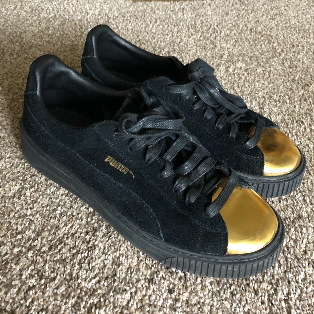 Gold toe black suede pumas